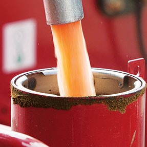 Red diesel flowing into a barrel Bulk Fuel Suppliers in Lancaster & North Lancashire